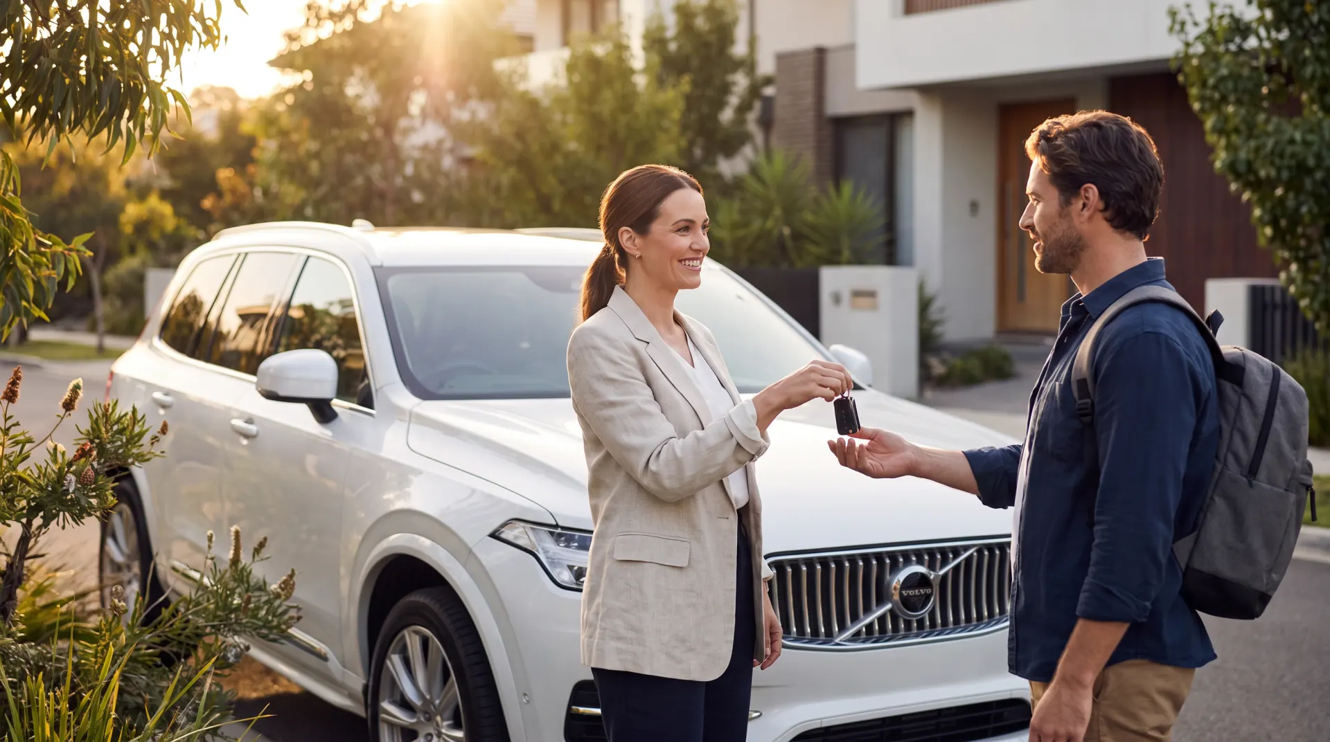 Car-share host handing keys to a guest